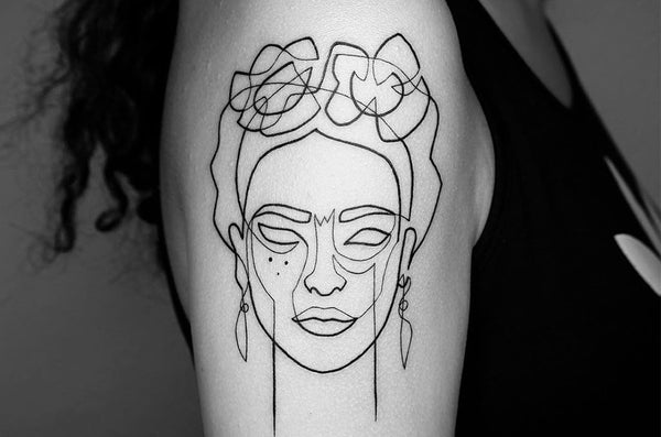 Minimalism: Single Line Tattoos by Artist Mo Ganjiby